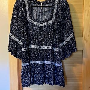 Free people. Can be worn as a top or short dress. 29 inches long.